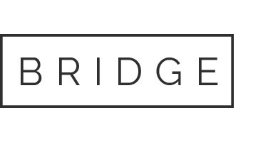 The word BRIDGE is displayed in simple gray font on a solid black rectangle. It may be representative of the architecture in Coquitlam, BC.