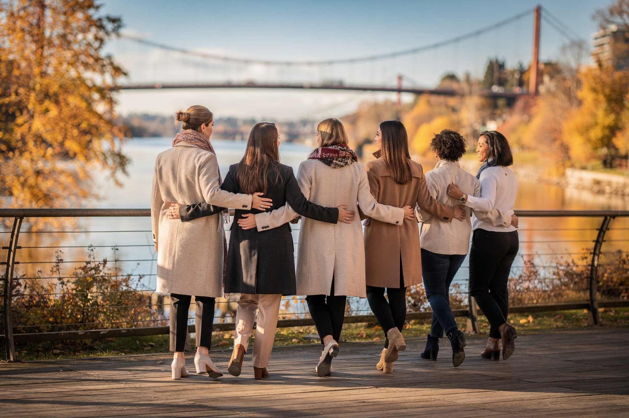 Counselling team walking together along a New Westminster riverside path