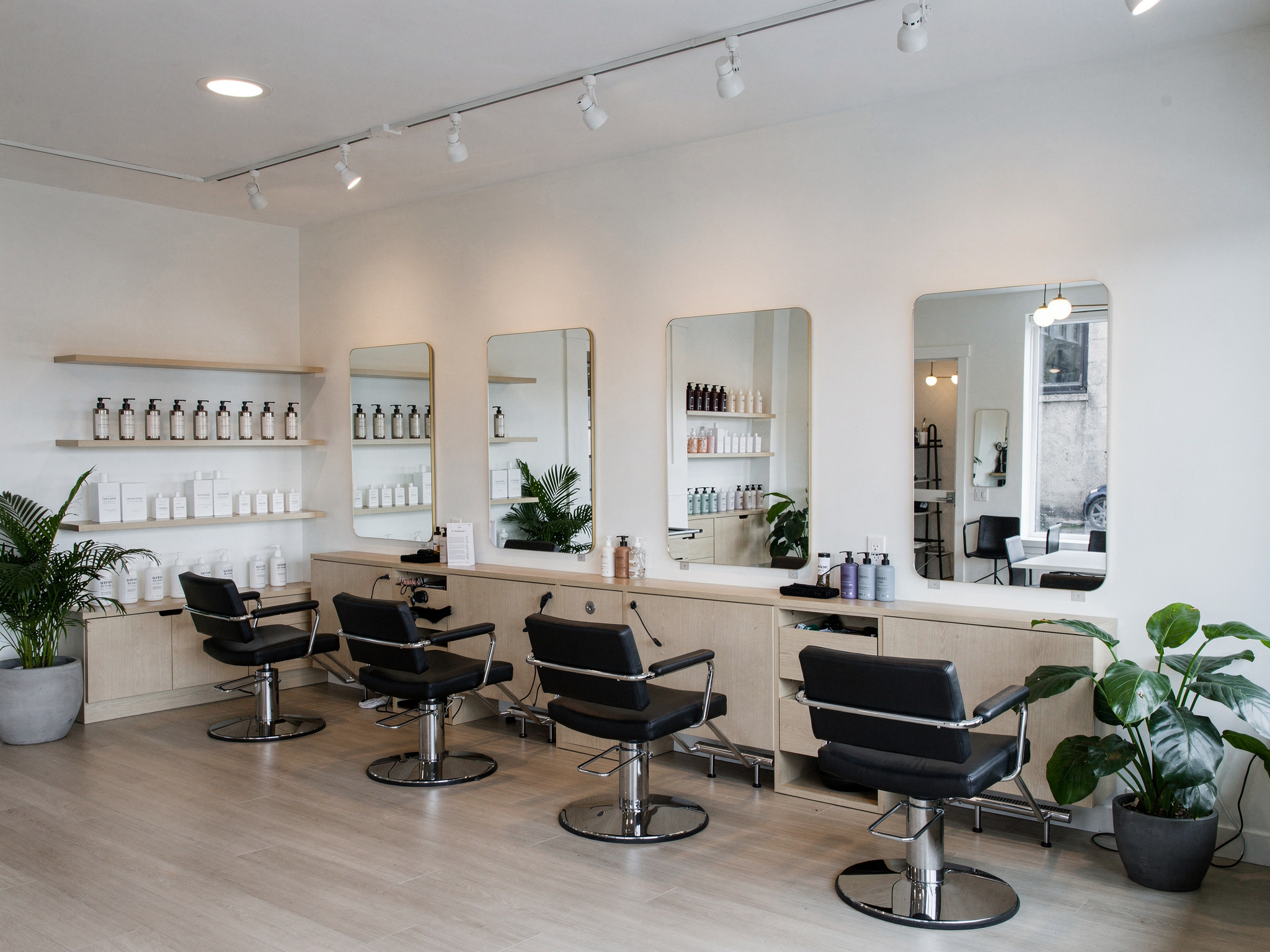 shop3 2 v2 Top Hair Salons in Coquitlam Lougheed Hair Design with clean salon mirrors and product shelves near Burquitlam