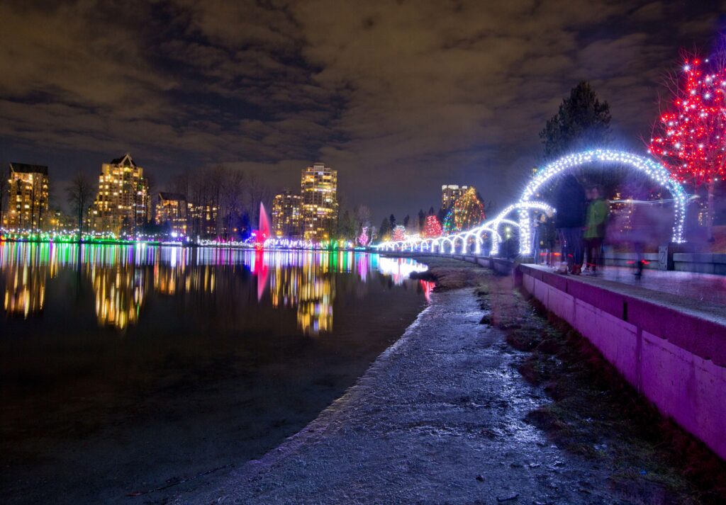 Christmas light arches reflected in Lafarge Lake at Lights at Lafarge in Coquitlam